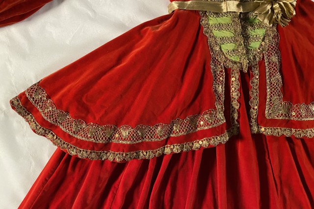 Detailed shot of red and green costume dress
