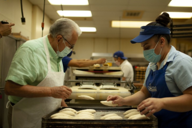 two people in a bakery 