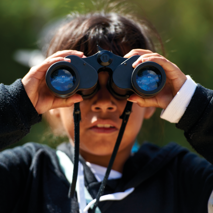 City Nature Challenge girl with binoculars