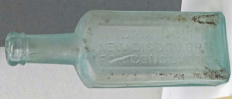 green glass medicine bottle