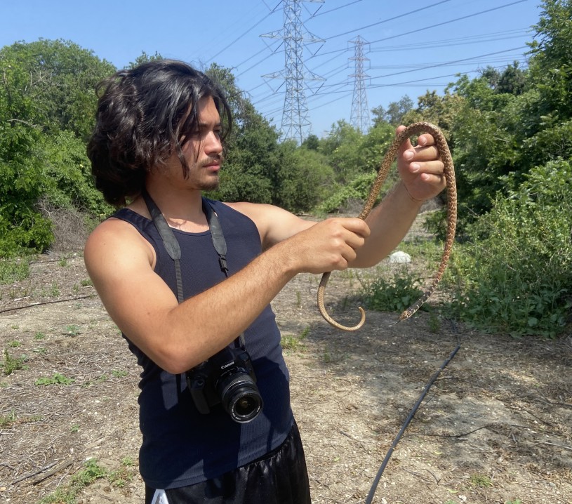 Boaz Benaiah Solorio with Coachwhip snake